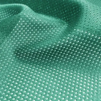 Close-up of micro-mesh performance golf apparel fabric texture